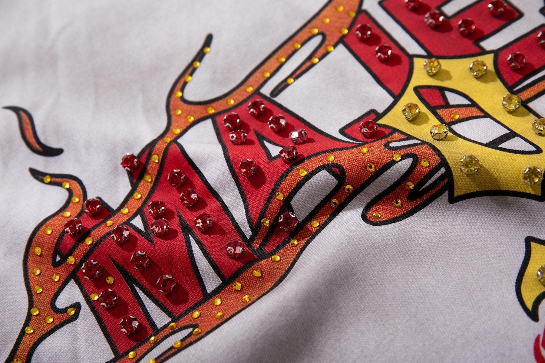 MAJESTIK Studded Washed Graphic Sleeveless T-Shirt ¡ª detail
