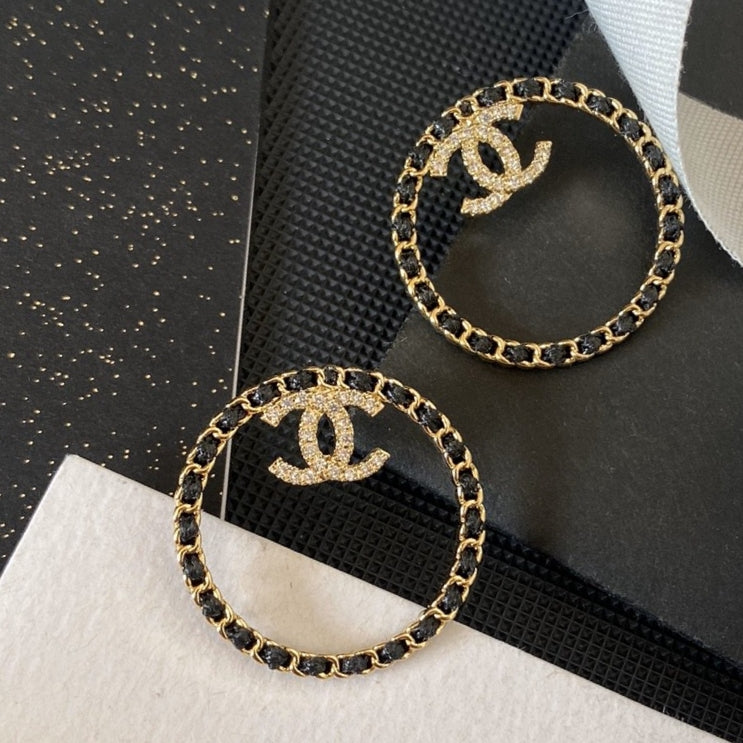 Chanel Black Leather Circle 18K Gold Earrings